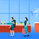 Travelers board airplane at airport gate.