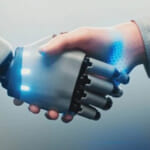 Image of robot and human hand shaking.